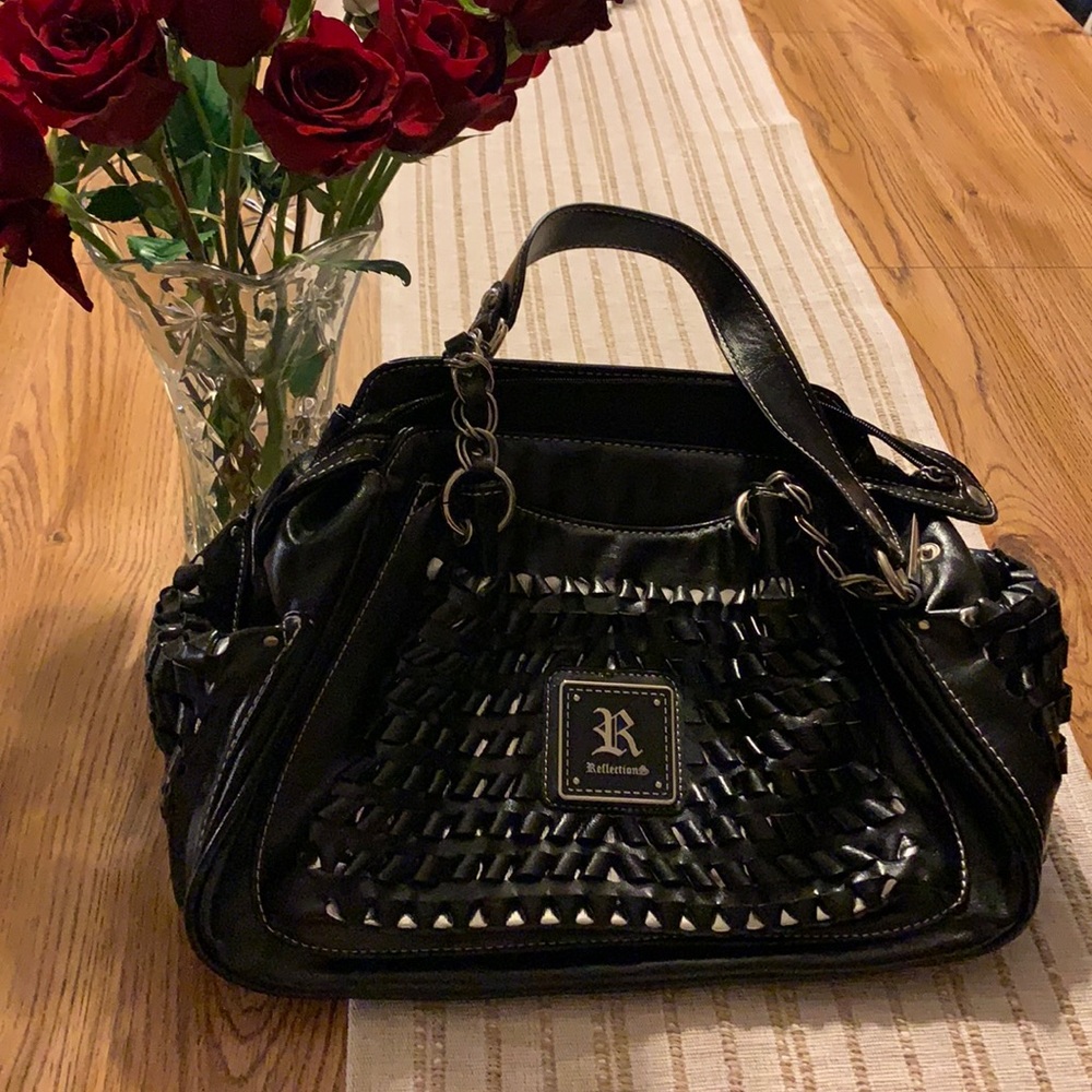 NWT. Never used.  Brand new.  Reflections handbag/shoulder bag purse.